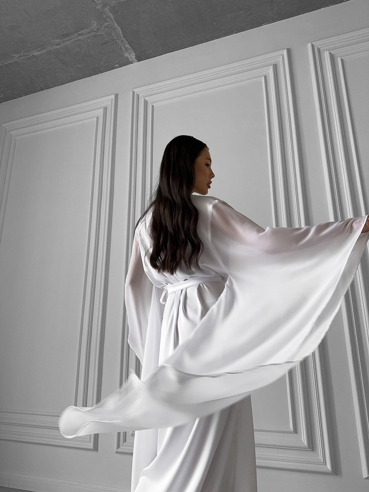 Create a vision of bridal beauty with our Long Silky Robe, featuring sheer chiffon kimono sleeves. Ideal for weddings and bridesmaids, this robe epitomizes sophistication. Okiya Studio