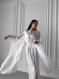 Indulge in the sheer charm of our Long Silky Robe with chiffon kimono sleeves—a timeless addition for weddings and bridesmaids, creating moments of pure elegance. Okiya Studio