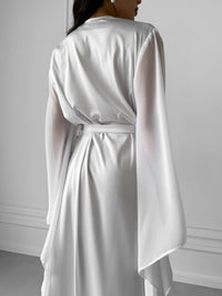 Effortless beauty meets sheer sophistication in our Long Silky Robe featuring chiffon kimono sleeves. Perfect for weddings and bridesmaids, this robe adds a touch of ethereal grace.