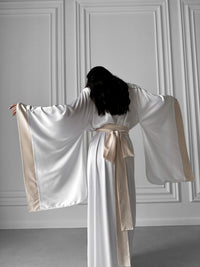 Transform your bridal morning into a luxurious affair with our Wedding Silk Robes. A must-have for brides and bridesmaids, these robes add a touch of opulence to the occasion. Okiya Studio