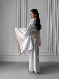 Elevate your bridal morning rituals with our Wedding Silk Robes. A thoughtful gift for bridesmaids, these robes add a touch of glamour to the wedding day preparations