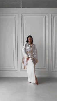 Step into elegance with our Wedding Silk Robes, perfect for bridal mornings and a cherished gift for bridesmaids. Embrace the enchantment of your special day in luxurious style.