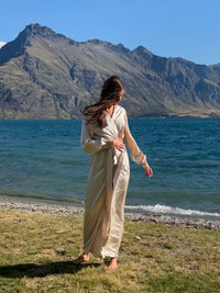 Nami floor-length two-tone satin robe in Oyster color, with full cuffed sleeves and a wrap sash — Okiya Studio