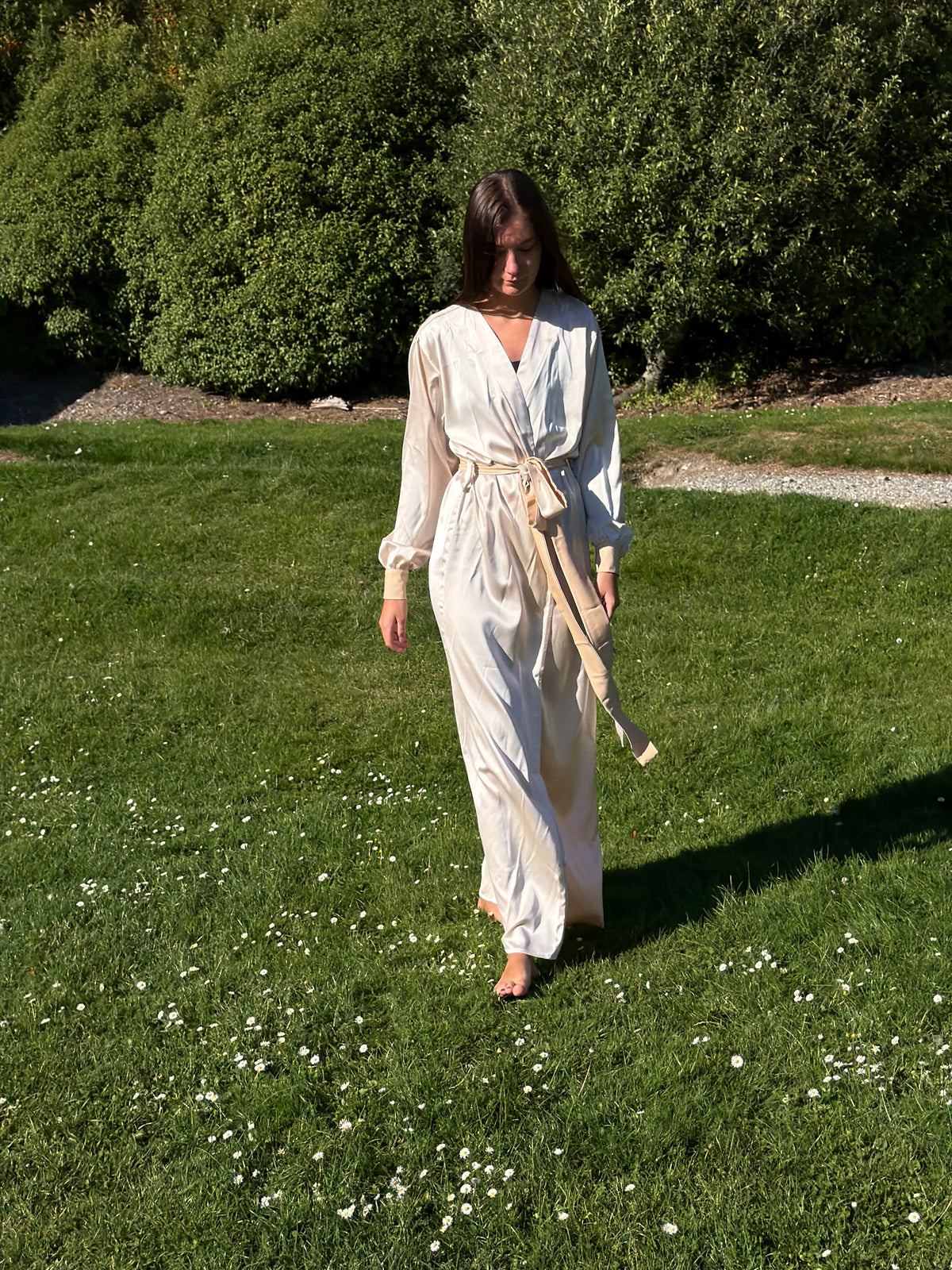 Ivory Nami satin robe worn belted, full-length outdoor view — Okiya Studio