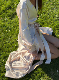 Ivory Nami satin robe worn belted, full-length outdoor view — Okiya Studio