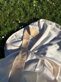 Fluid satin drape and floor-length hem of the Nami robe — Okiya Studio
